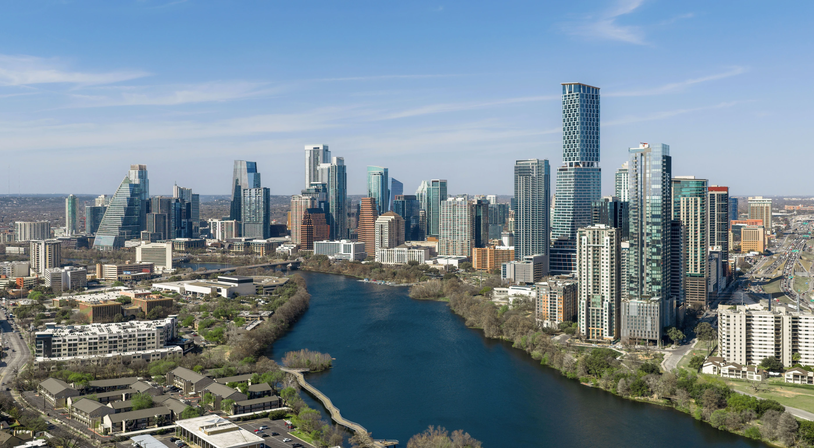 Actual Austin skyline and Lady Bird Lake photographed from the southeast in March 2026